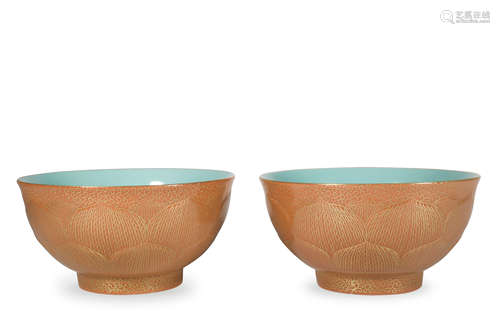 A pair of allite red glazed bowl