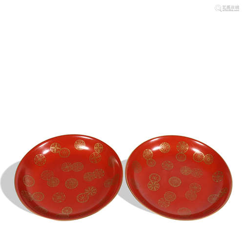 A pair of red glazed plate