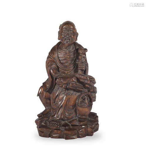 A boxwood figure