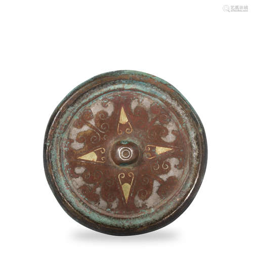 A bronze mirror ware with gold and silver