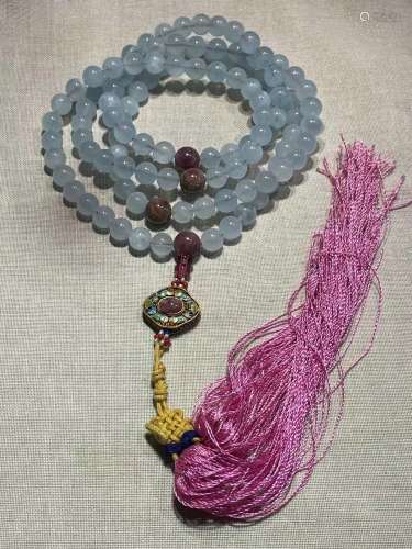 a string of chinese buddha bead
