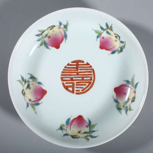 White peach plate with beige outside and pastel inside in Qi...