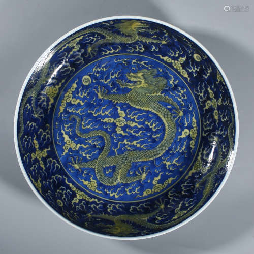 Qing Kangxi blue and white yellow dragon pattern plate
