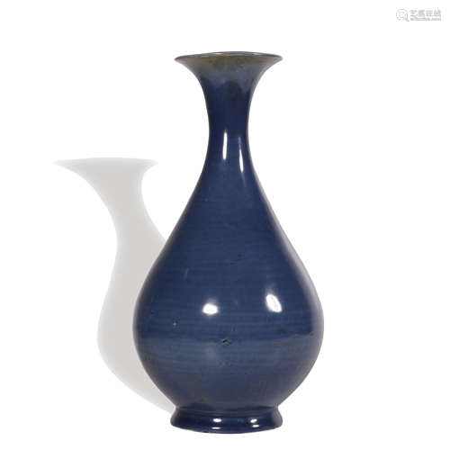 A blue glazed pear-shaped vase