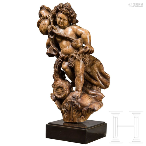 A remarkable carved alabaster sculpture of Bacchus,