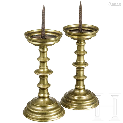 A pair of German pricket candlesticks, 16th century