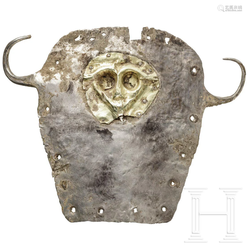 An Elamite bull's head appliqué, 3rd - 2nd