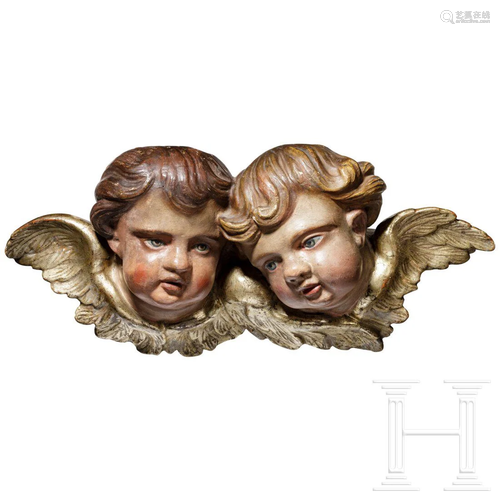 A pair of German putto's heads, ca. 1800