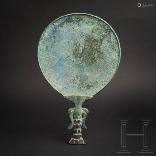 An Elamite-Sumerian bronze mirror, 2nd millennium B.C.