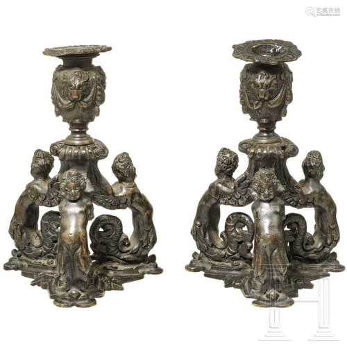 A pair of Italian candlesticks in Renaissance style,