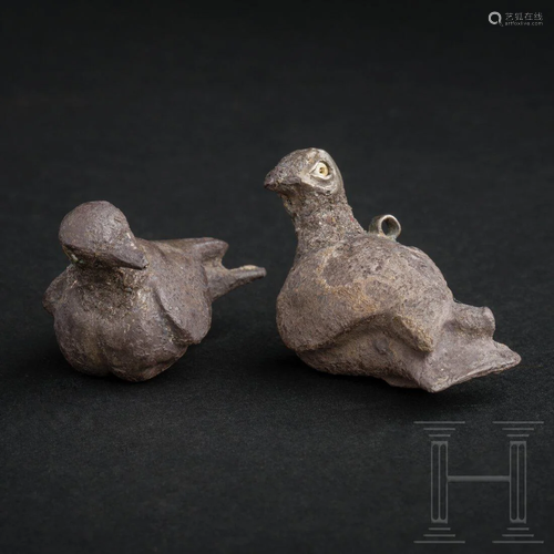 A pair of silver Elamite dove pendants, circa 3000 -