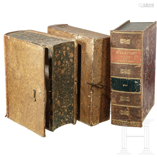 Three French secret boxes in the shape of books, circa