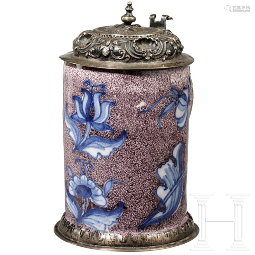 A small silver-mounted faience tankard, probably