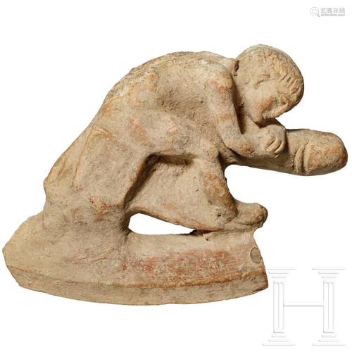 A Roman terracotta figurine of a sleeping Satyr, 1st -