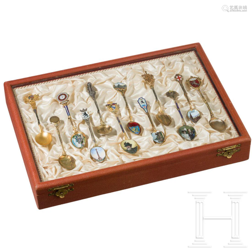 A German collection of 24 enamelled silver souvenir