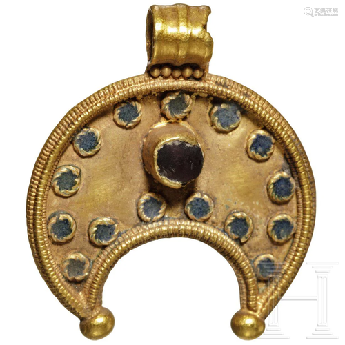 A Roman golden lunula pendant, 1st - 3rd century