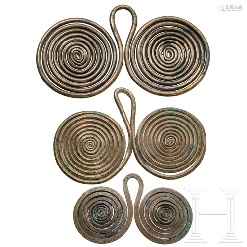 Three Central European spectacle pendants, Bronze Age,