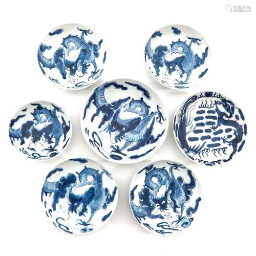 A Collection of 7 Blue and White Plates