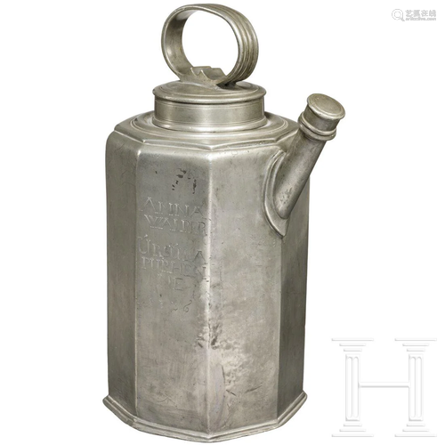 A large Swiss pewter jug with inscription, dated 1736