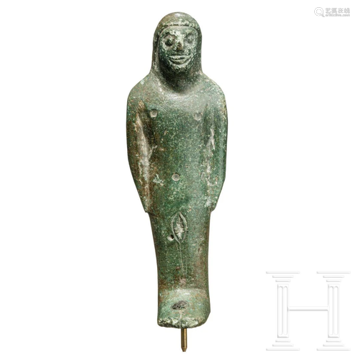 An Etruscan bronze kore, 5th century B.C.