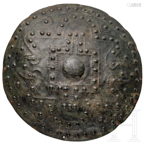 A bronze shield with Bronze Age decoration