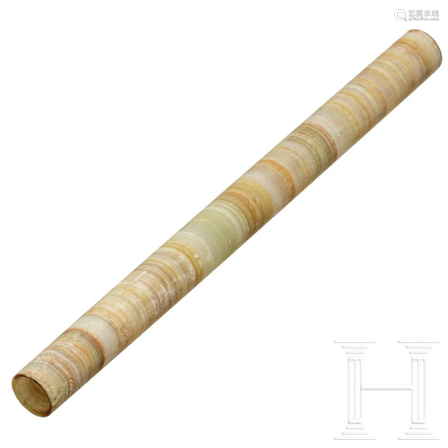 A long Persian alabaster tube, 2nd millennium B.C.