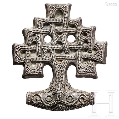 A charmful Viking silver pendant, 10th century