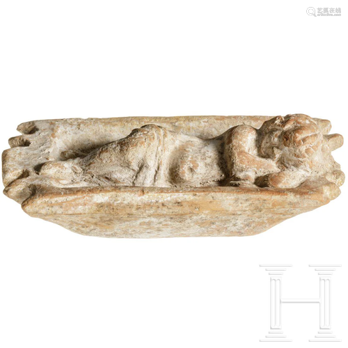 A Roman terracotta figure of the sleeping Eros, 2nd -