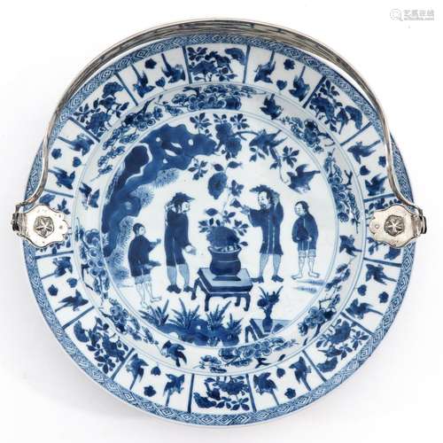 A Blue and White Plate with Silver Handle