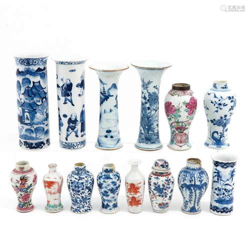 A Collection of Garniture Vases