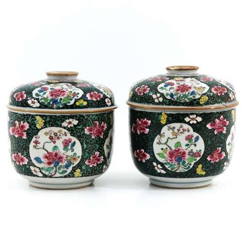 A Pair of Famille Verte Jars with Covers