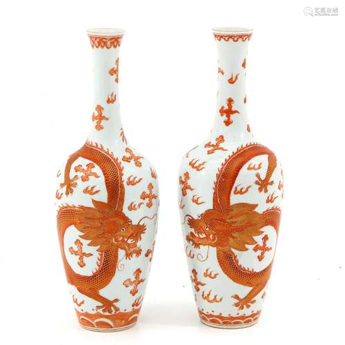 A Pair of Orange and Gilt Decor Vases