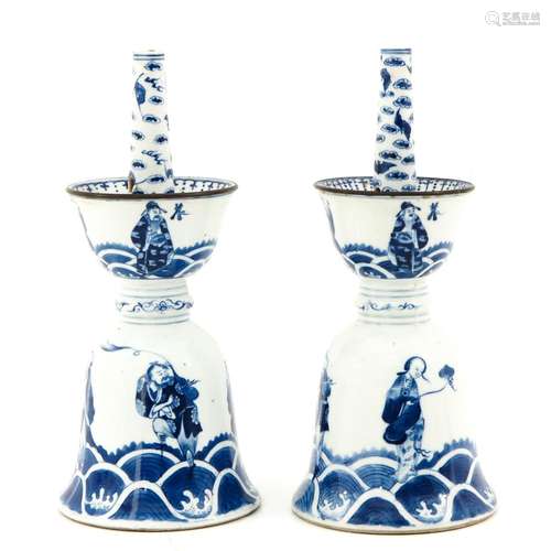 A Pair of Blue and White Altar Candlesticks