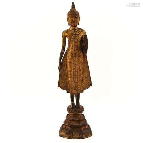 A Tibetan Standing Buddha Sculpture