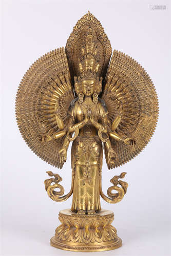 A Gilt Copper Guanyin Bodhisattva Statue.