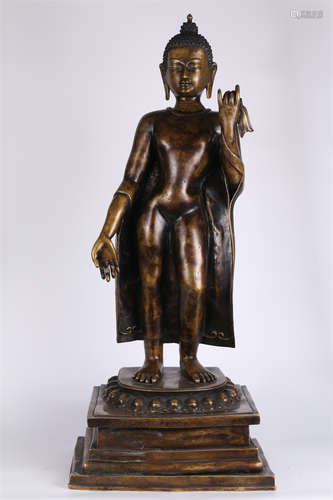 A Copper Standing Sakyamuni Buddha Statue.