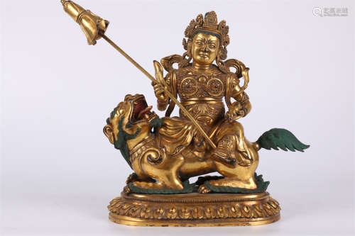 A Gilt Copper Vaisravana Buddha Statue.