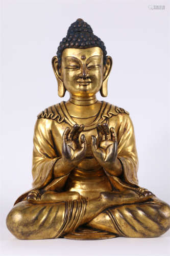 A Gilt Copper Sakyamuni Buddha Statue.