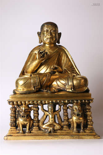 A Gilt Copper Guru Buddha Statue.