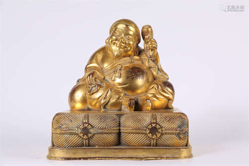 A Gilt Copper Old Man Buddha Statue.