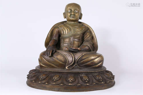 A Copper Guru Buddha Statue.