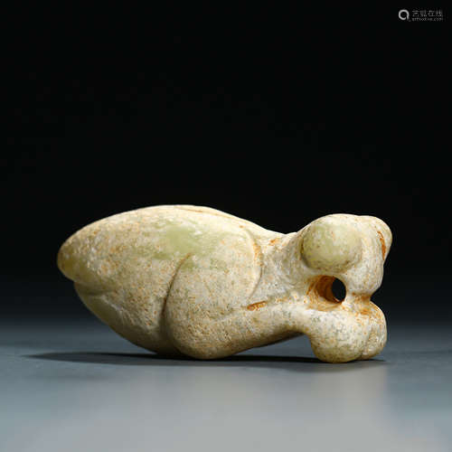 A Carved Chicken Bone Jade Ornament