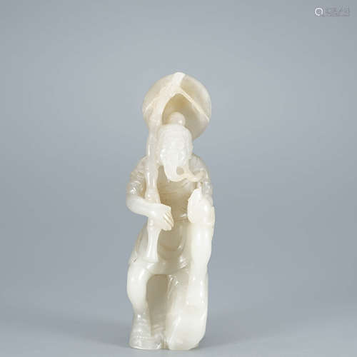 A Carved White Jade Figure of Fisherman