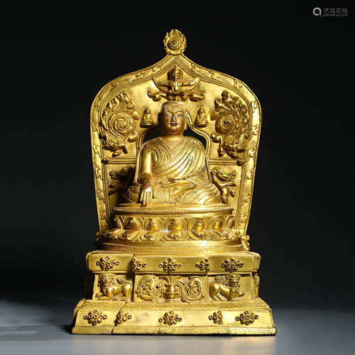 A Gilt Bronze Figure of Guru with Halo