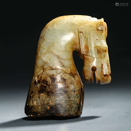 A Carved Brownish Jade Head of Horse