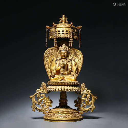 A Gilt Bronze Figure of Guanyin with Halo