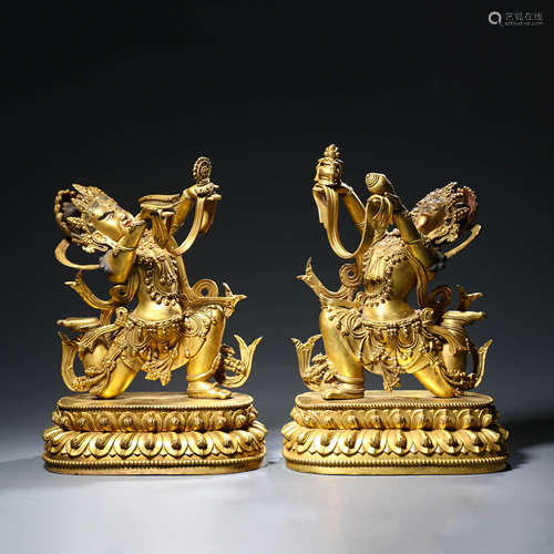 A Pair of Gilt Bronze Figures of Dragon Buddha