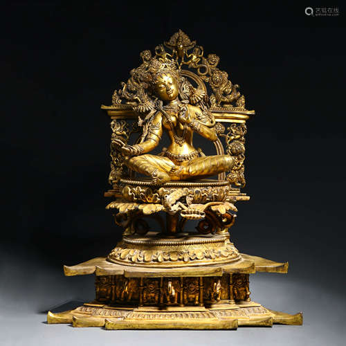 A Gilt Bronze Figure of Tara with Halo