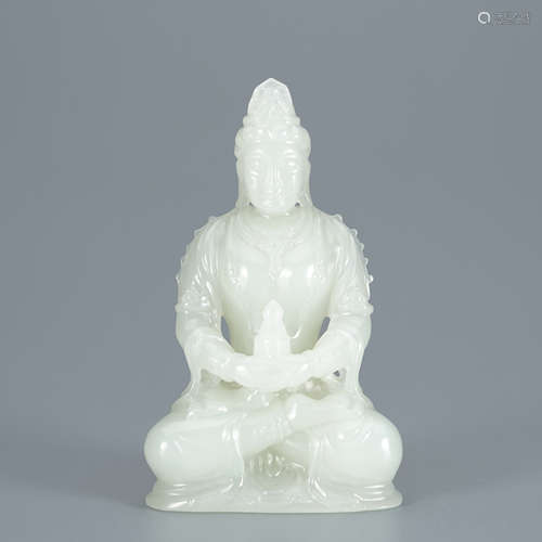 A Carved White Jade Figure of Guanyin