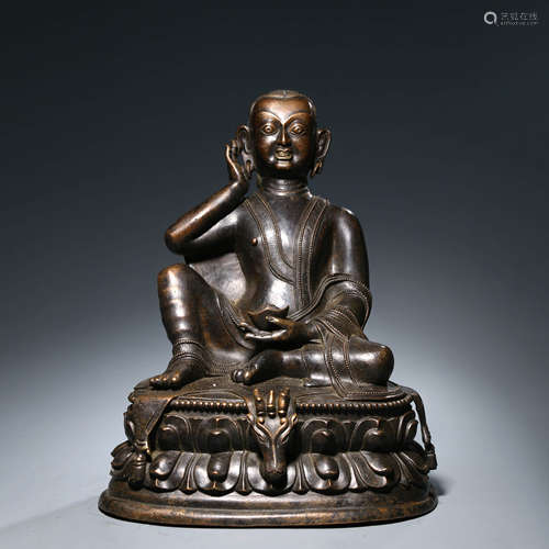 A Bronze Cast Seated Buddha